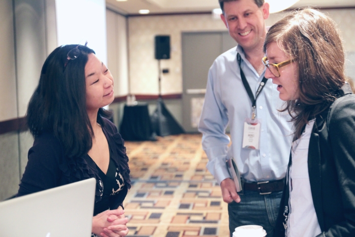 Melanie Phung speaking to CONFAB attendees after her presentation. Photo © Sean Tubridy, Brain Traffic/Confab Events